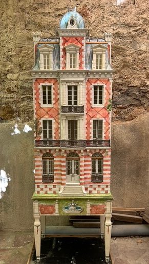 Red brick dollhouse with leaded glass roof, decorated in the second empire style