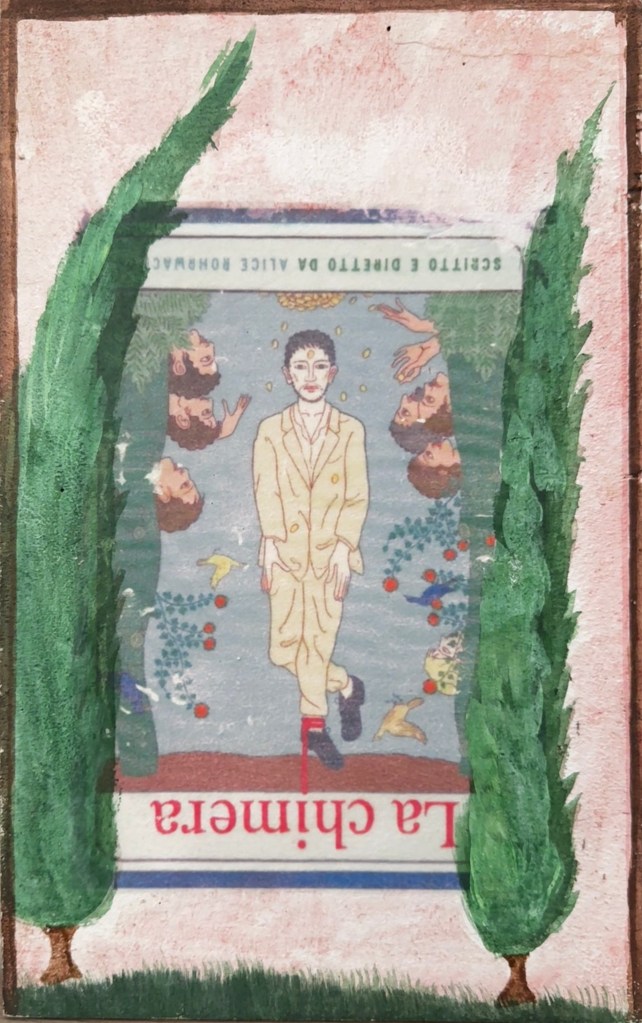 A vintage La Chimera poster of a man tap dancing in a tan suit on a blue background. He is framed by two cypress trees blowing in the wind, all against a light pink background.